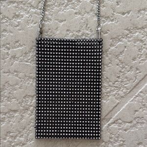 Sleek Silver Crossbody Bag with Chain Strap
